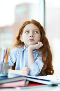 Girl thinking about philosophy for kids 